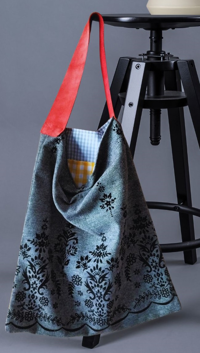bolso artesanal único hecho a mano telas recicladas relieve floral vichy gris asas ante naranja tote bag sostenible